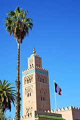 Image showing history in maroc africa  minaret religion french waving flag