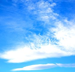 Image showing in the blue sky white soft clouds and abstract background