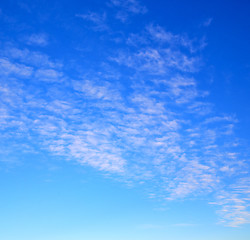 Image showing in the blue sky white soft clouds and abstract background