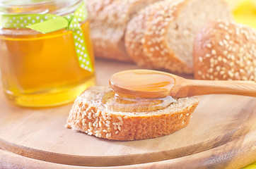 Image showing honey and bread