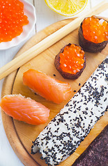 Image showing Fresh rolls and sushi with salmon