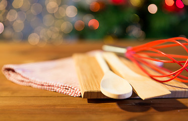 Image showing close up of kitchenware set on wooden table