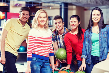 Image showing happy friends in bowling club