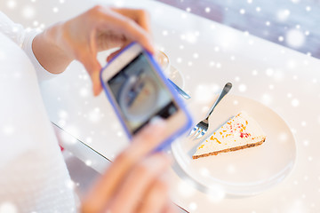 Image showing woman hands with smartphone taking food picture