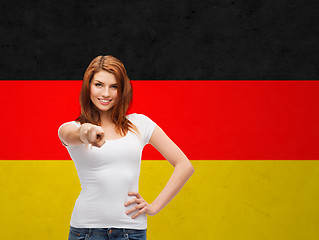 Image showing woman in t-shirt pointing at you over german flag