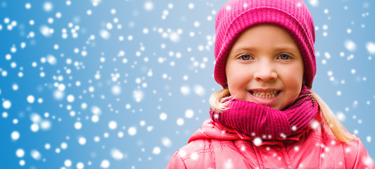 Image showing happy little girl portrait over snow background