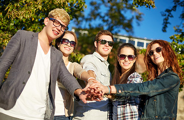 Image showing group of students or teenagers with hands on top