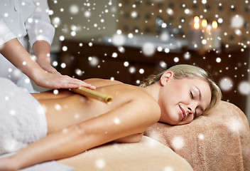 Image showing close up of woman lying and having massage in spa