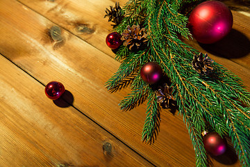 Image showing fir branch with christmas ball and pinecones