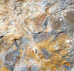 Image showing rocks stone and red orange gneiss in the wall of morocco