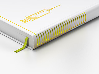 Image showing Health concept: closed book, Syringe on white background