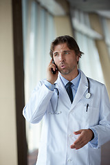 Image showing doctor speaking on cellphone