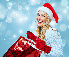 Image showing Beautiful young woman in Santa Claus clothes