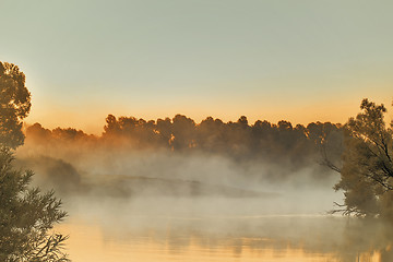 Image showing Early foggy morning and a small river.