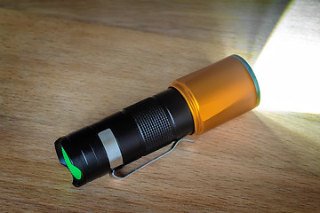 Image showing Included electric torch with a beam of light.