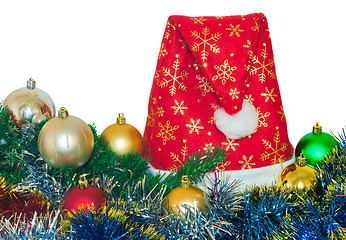 Image showing Cap Santa Claus and gifts on white background.