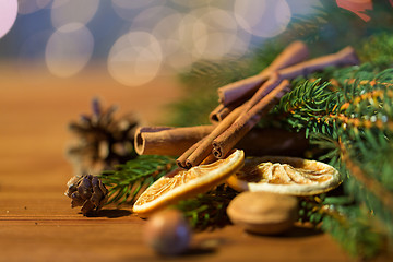 Image showing christmas fir branch, cinnamon and dried orange