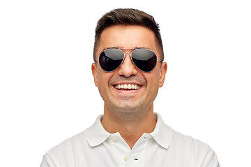 Image showing face of smiling man in polo t-shirt and sunglasses