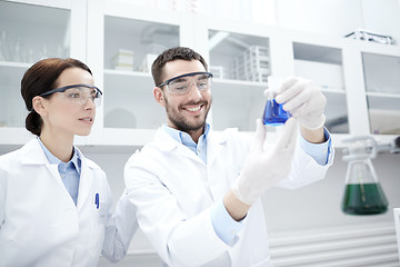 Image showing young scientists making test or research in lab