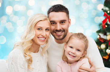 Image showing happy family at home with christmas tree