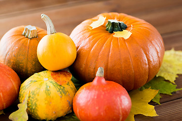 Image showing close up of pumpkins on wooden table at home