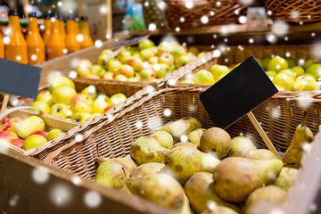 Image showing fruits in baskets with nameplates at food market