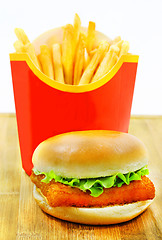 Image showing Burger with fries and fish  