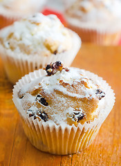 Image showing Sweet Muffins with tea on the table