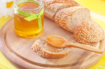 Image showing honey and bread