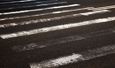 Image showing worn road markings  