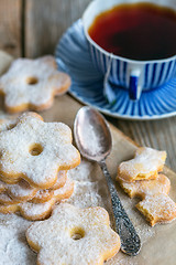 Image showing Italian cookies, spoon and a cup of tea.