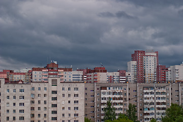 Image showing gray clouds over the urban landscape