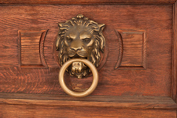 Image showing bas-relief of a lion's head with a ring in its mouth