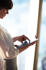 Image showing business woman working on tablet computer