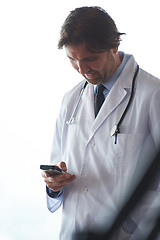 Image showing doctor speaking on cellphone