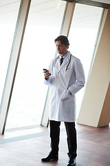 Image showing doctor speaking on cellphone