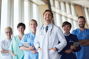 Image showing group of medical staff at hospital, handsome doctor in front of 