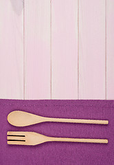 Image showing Kitchenware on purple towel