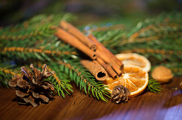 Image showing christmas fir branch, cinnamon and dried orange