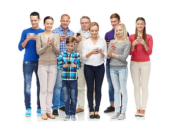 Image showing group of smiling people with smartphones