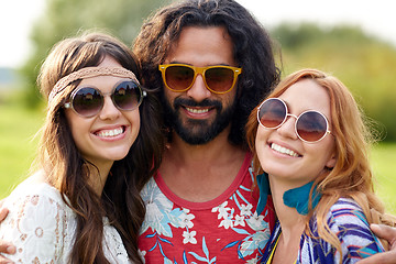 Image showing smiling young hippie friends outdoors