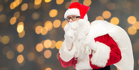 Image showing man in costume of santa claus with bag