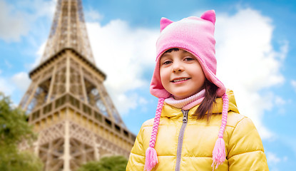 Image showing happy little girl over eiffel tower in paris