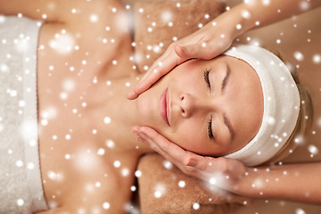 Image showing close up of woman having face massage in spa salon