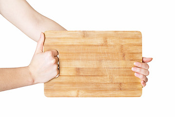 Image showing hands holding chopping board