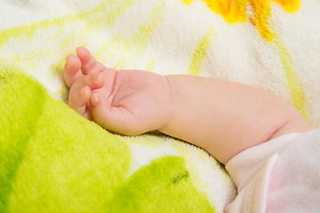 Image showing Small hand the sleeping baby