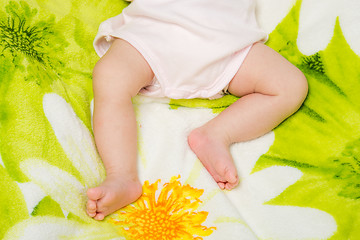 Image showing Small legs sleeping baby