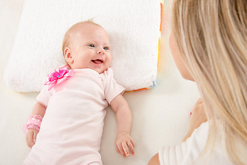 Image showing Happy two-month girl looking at mother