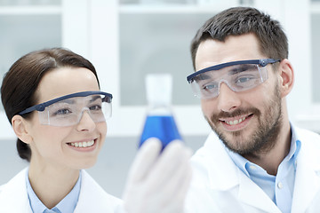 Image showing young scientists making test or research in lab