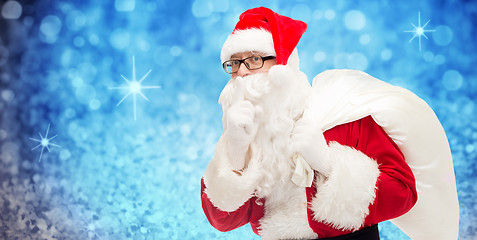 Image showing man in costume of santa claus with bag